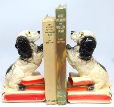 A pair of ceramic cocker spaniel bookends.