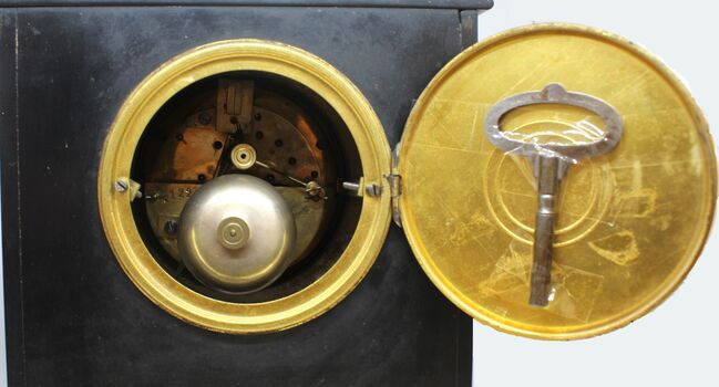 Rear door open to show mechanism and key