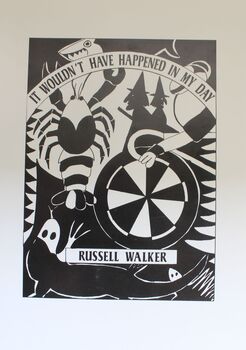 Black and White cover including a spider, dart board and witches