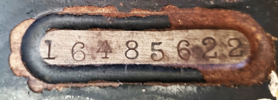 Serial number attached to front of machine