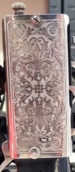 Engraved plate design on end plate of machine