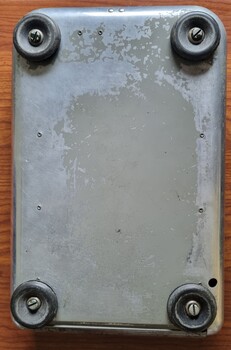 Docket Dispenser - rear view showing support attached on each corner