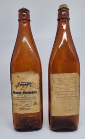 Old Kerosene and Methylated spirits bottles with beige printed labels