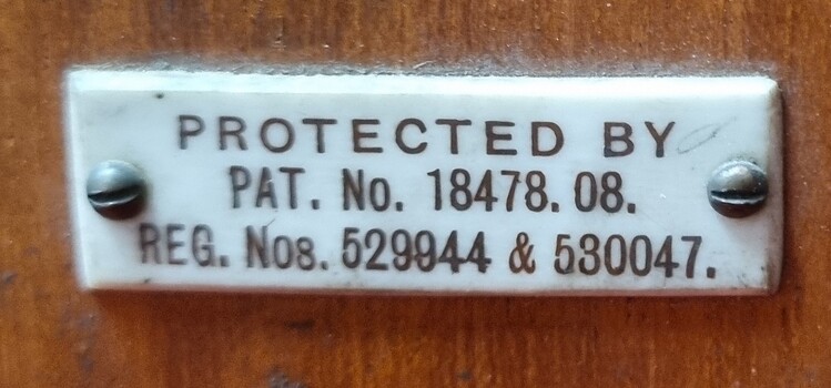 Thornton-Pickard Ruby Enlarger Badge showing Patent Label