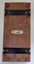 Flower press back showing label of Henry Buck Pty. Ltd
