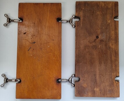 Flower press showing inside view and clasps