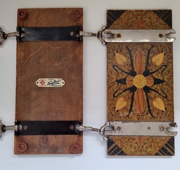 Flower Press showing the back and front and open catches.