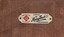 Label of Henry Buck Pty. Ltd. of London and Melbourne attached to the back of the flower press.