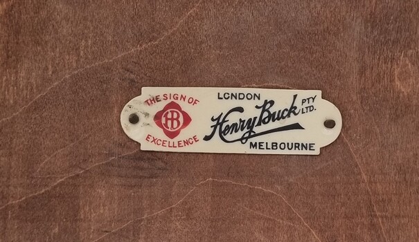 Label of Henry Buck Pty. Ltd. of London and Melbourne attached to the back of the flower press.