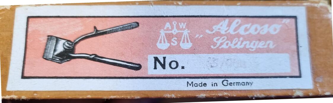 Side  view of box showing hairclipper image