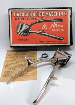 Box and pair of hairclippers and instruction sheet