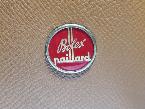 Bolex Paillard red and silver logo on side of case