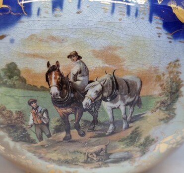 Rural scene on side 2 of bowl depicting 2 horses and 2 men - one on horseback and the other on foot.