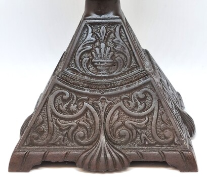 View of floral design on lamp base.