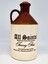 A brown and beige  All Saints' Tawny Port Wine Jug