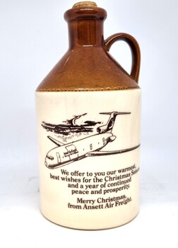 All Saints Estate Wine jug reverse side showing Ansett Air Freight Christmas message.