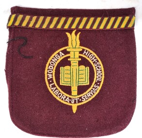 Wodonga High School Blazer pocket emblem showing open book and torch