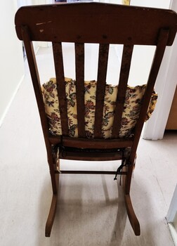 Rear view of rocking chair showing replacement slats