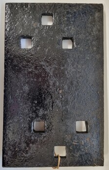 A heavy metal fish line plate used to connect pieces of rail track - top view