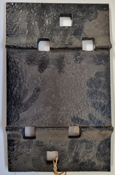 A heavy metal fish line plate used to connect pieces of rail track - reverse side