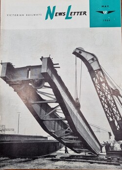Cover May 1964 picturing loading girders