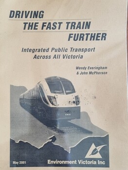 Front cover showing a locomotive superimposed on a map of Victoria