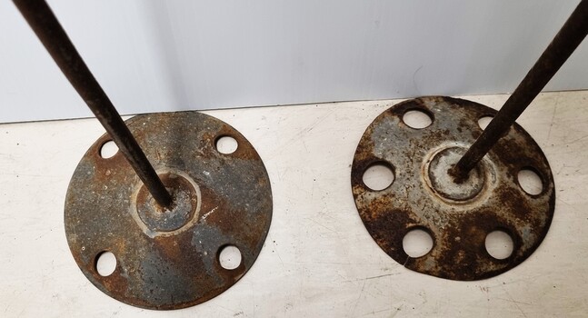 Circular base of stirrer showing holes to allow flow