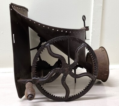 Side view of broadcaster showing hand crank