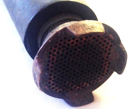 Base of pump showing mesh filter