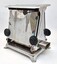 Hecla toaster showing side view, opening knobs and electricity socket