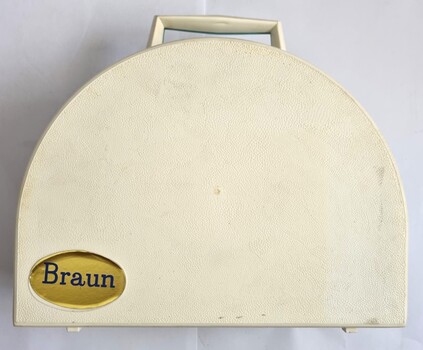 Beige coloured case labelled with the brand "Braun"