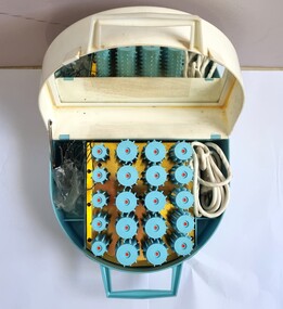 Hair styling set of heating unit and rollers in case