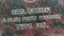 Manufacturer's name inscribed under ashtray