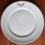 White plate with maroon logo of Victoria Railways