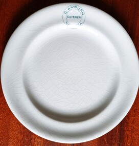 Round plate inscribed with the logo of G. Awburn Wodonga