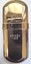 A gold cigarette lighter engraved "Peter Jackson Brass NO. 6"