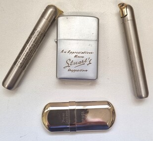 A collection of 4 cigarette lighters
