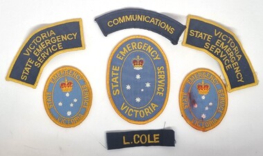 A selection of cloth uniform badges for the SES Wodonga.
