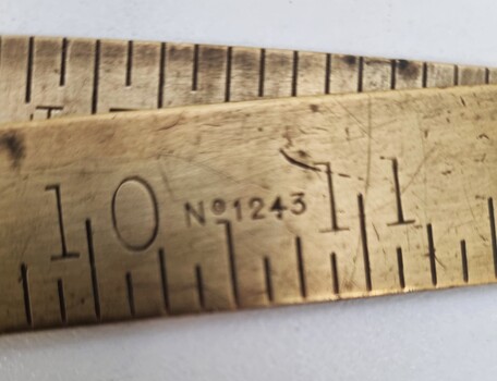 Model number etched into the side of ruler