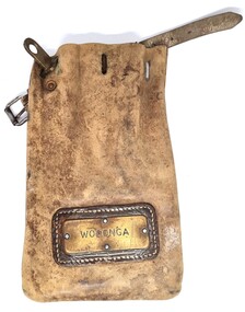 Leather pouch with metal name plate engraved "WODONGA"