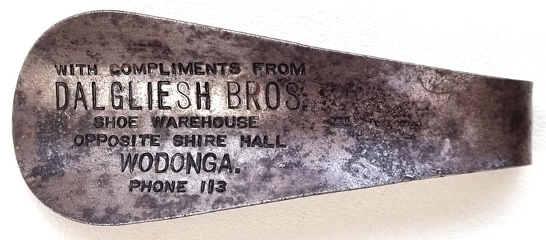 Souvenir Shoe Horn from Dalgleish Shoe Warehouse with business inscription