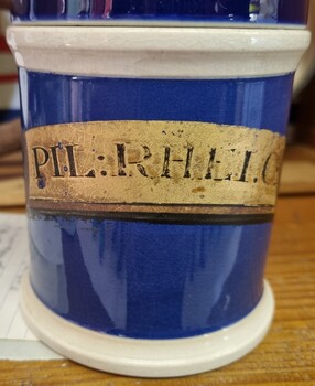 Jar showing gold labelling of conents
