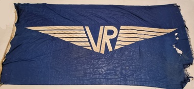 A navy blue flag with gold insignia of Victorian Railways