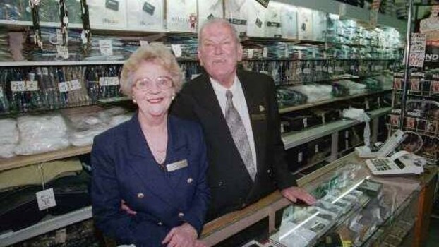 Image of Leonard and Dulcie Higginson taken in the shop on 25th September, 1998 on the 40th anniversary of the business.