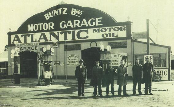 6 staff members at the front of Buntz Garage