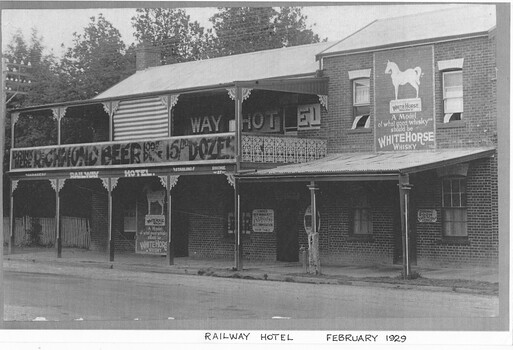 Old two storey hotel building with a balcony across part of building. A verandah is across the whole building