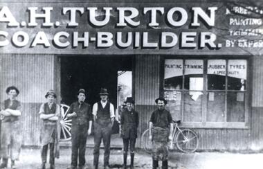 6 men standing outside the premises of A. H. Turton, Wodonga