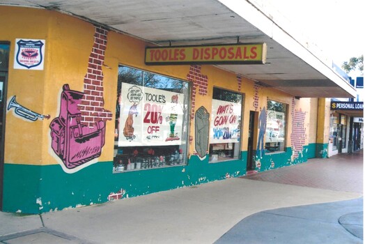 Toole's Disposals windows and sale posters for closing down sale, 2011