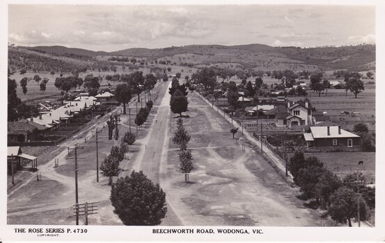 A Rose Series postcard of Beechworth Road C1940. The McHarg home is the most prominent building on the right.