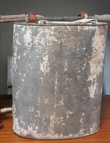 Simpson Knapsack made from galvanised iron with spray rod attached.